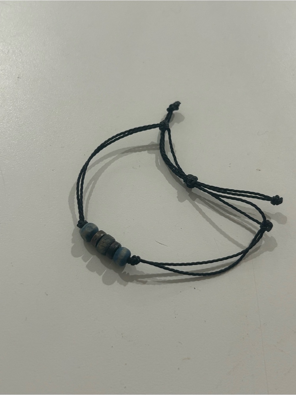 Adjustable Black Cord Bracelet with Blue and Brown Beads